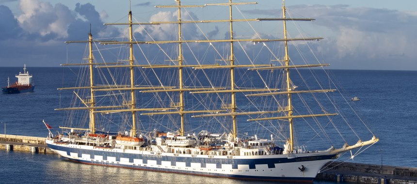 Five-masted sailing ship in port